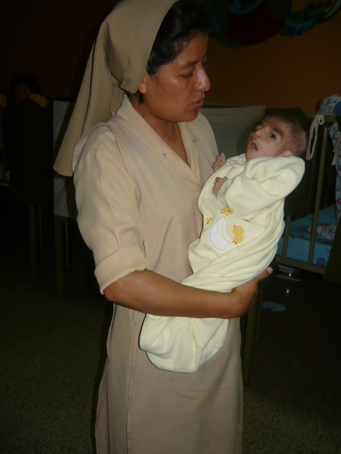 Hermana Veronica comforting Esteban