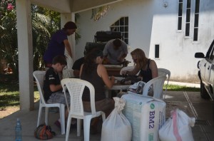 All hands on deck for the tedious job of planting seeds